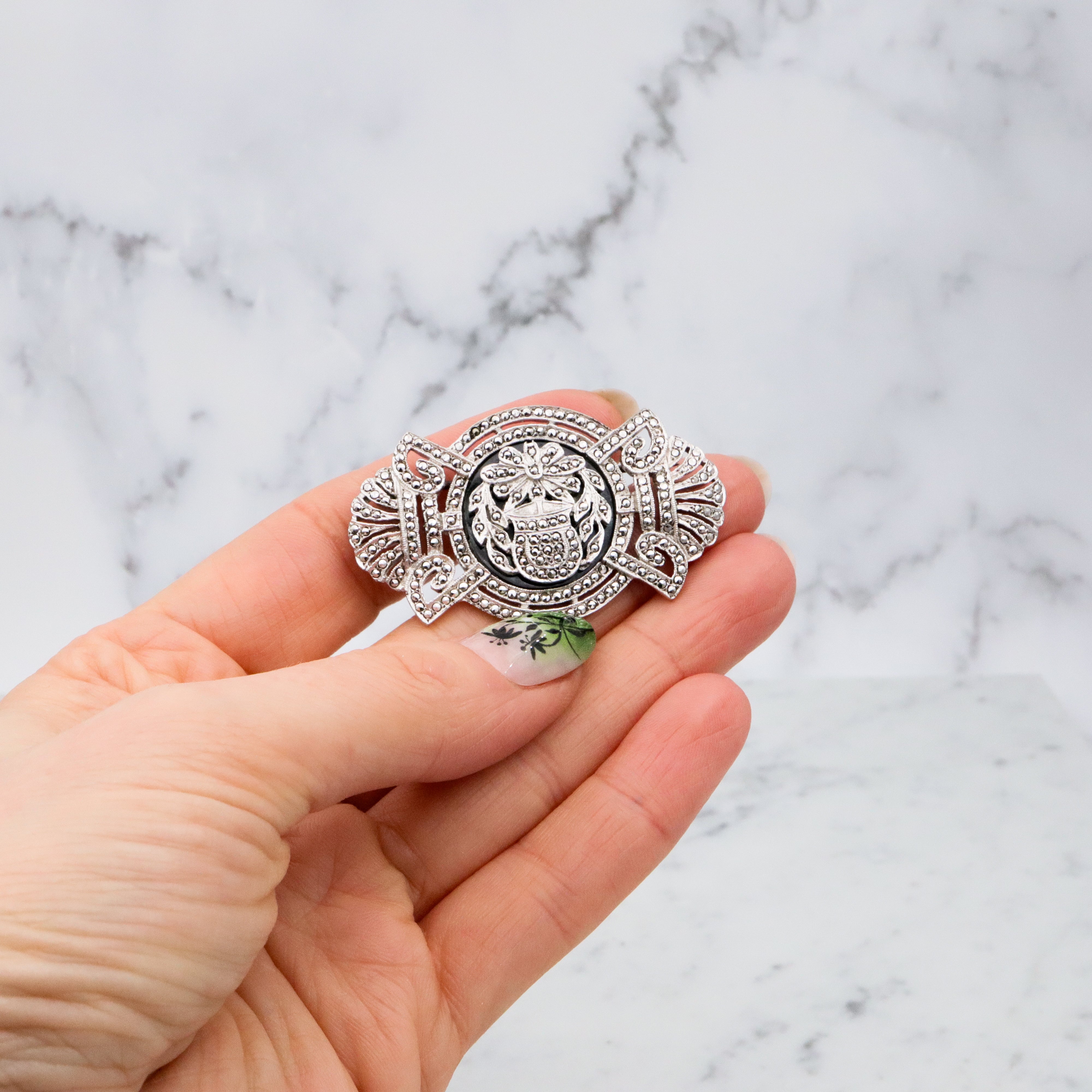 Antique Art Deco sterling marcasite floral framed brooch by EAGLE